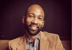 A transformative mentoring approach for urban youth by Bwana Clements featuring a black man with a beard.