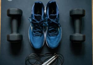 Mission fit means being physically prepared. A pair of blue running shoes and dumbbells can help.