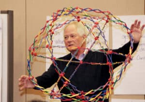 Peter O'Donnell holds a Hoberman sphere