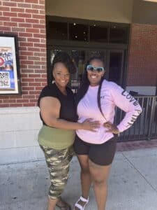 Catrina and her daughter, Tacara showing support for DVULI and urban youth leaders.